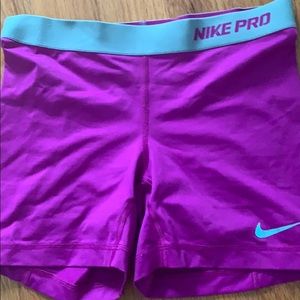 nike pros purple and teal